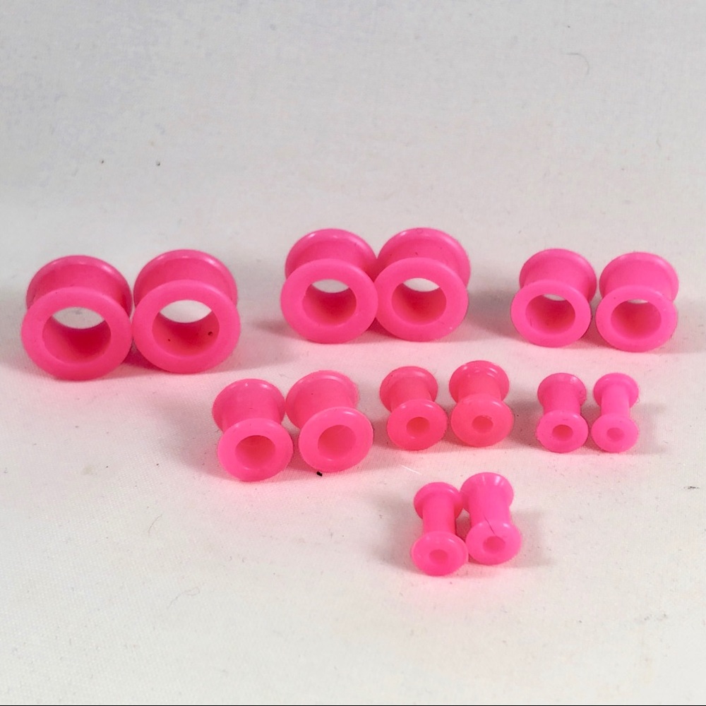 Pair of Double Flare Pink Silicon Ear Tunnels